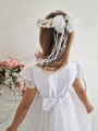 biala sukienka komunijna z ozdobnymi haftami